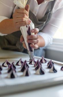 shaped nozzles to create designs or decorations e.g. meringues.