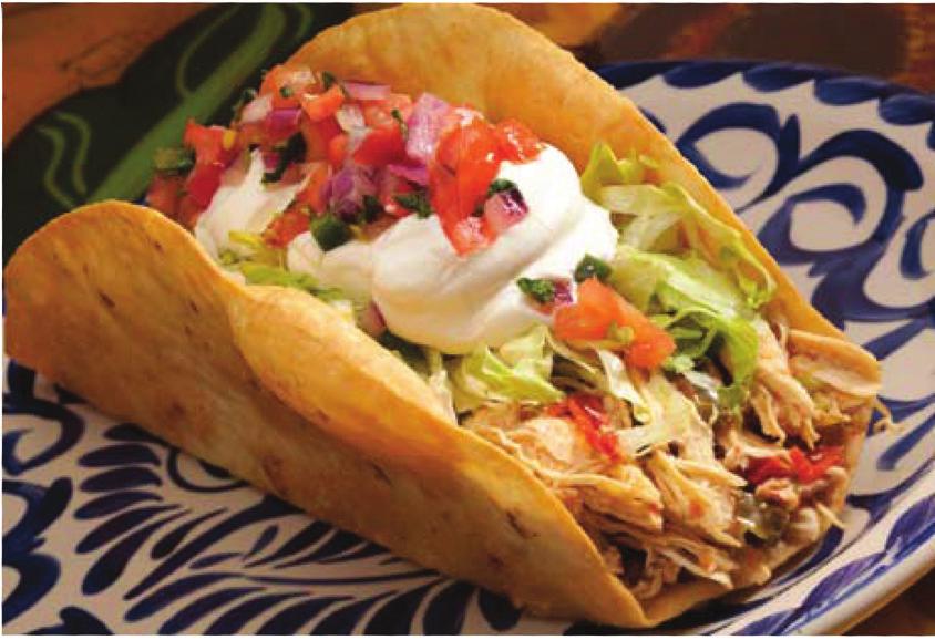 .. 6.75 A large crispy flour tortilla filled with ground beef or shredded chicken and cheese sauce. Topped with lettuce, tomato and sour cream. Taco Salad Fajita... 7.