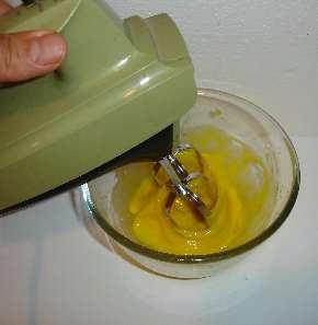 Step 4 - Whip the egg yolks until thickened Put the egg yolks in a medium bowl and whisk