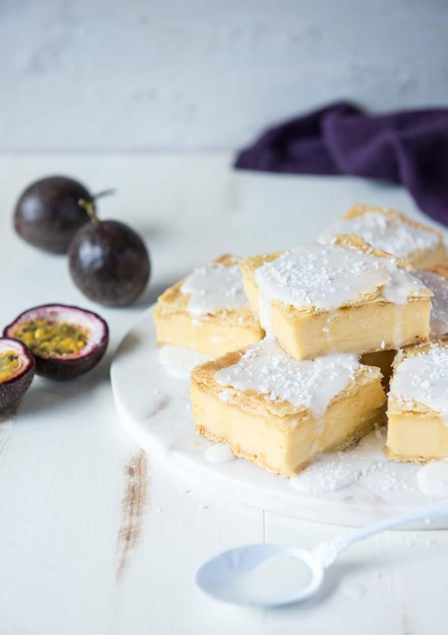 Passionfruit Custard Slice Love creamy vanilla slice? Try our passionfruit version topped with tropical coconut icing!