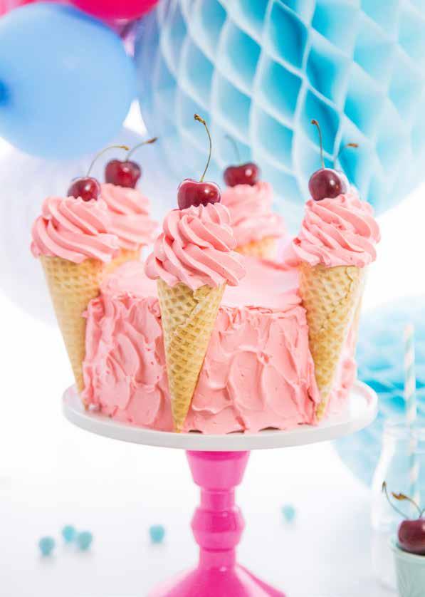 Strawberries & Cream Party Cake SERVES: 12 PREP: 45 MIN COOK: 50 MIN DIFFICULTY: MEDIUM This fun, playful cake is a creamy strawberry dream!