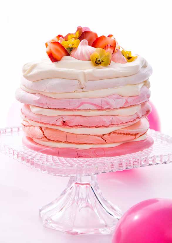 Pretty In Pink Pavlova SERVES: 8 PREP: 45 MIN COOK: 30 MIN DIFFICULTY: MEDIUM Dressed to impress, this tower of layered marbled peachy-pink meringues and cream makes an incredible finale to a very