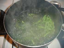 Begin counting the blanching time as soon as you place the green beans in the boiling water.