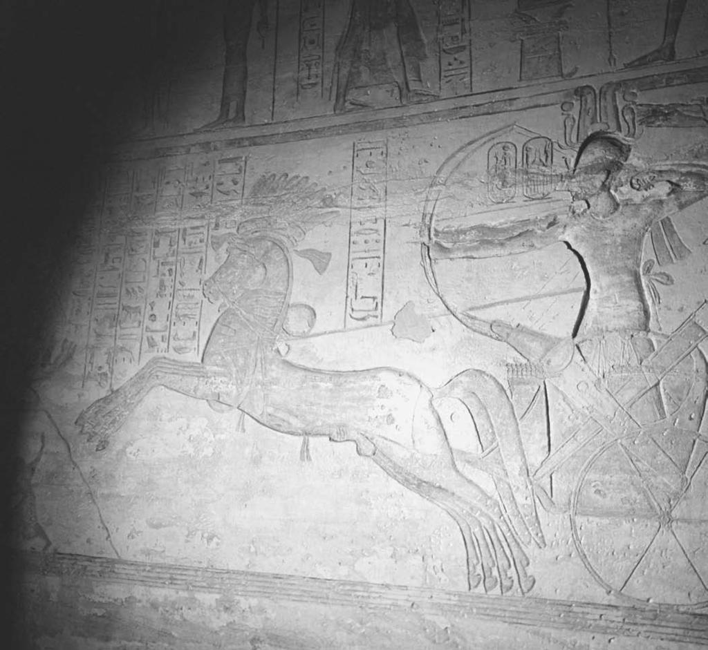 254 warfare and weapons Ramesses (r. c. 1304 c. 1237 BCE), riding a chariot, storms a Syrian fortress in this relief from the Great Temple at Abu Simbel.