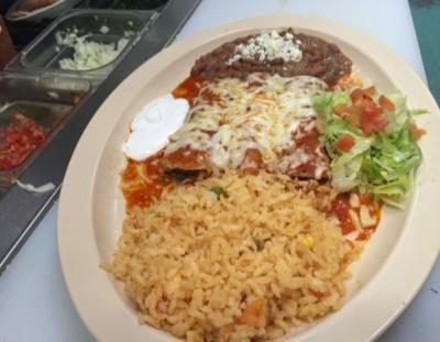 99 Steak topped with tilapia fillet. Served with tortillas. NEW CARNE ASADA CON CAMARONES NEW TACO DINNER $19.99 Steak topped with shrimp. Served with tortillas. SOFT DRINKS ORANGE JUICE 100% $3.