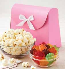 99 POP OF PINK POPCORN TINS Celebrate spring, or your favorite lady on her special day, with gourmet popcorn in a sweet pink tin, tied up with a sweet bow and message tag of your choosing.