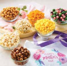 U D C FANCY FLORAL GRAND SNACK ASSORTMENT This delightful 2-gallon tin is filled with Peach-filled Galettes, Milk Chocolate Popcorn Bites, Foilwrapped Sour Candies, and 4 flavors of