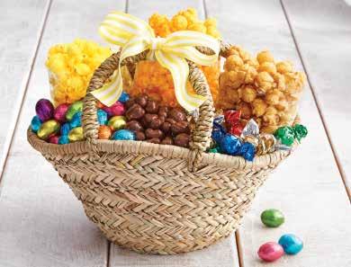 T9505 $39.99 C POPCORN CELEBRATION EASTER BASKET A two-handled, woven seagrass basket, accented with a yellow and white stripe ribbon, makes a lovely hostess gift or centerpiece.
