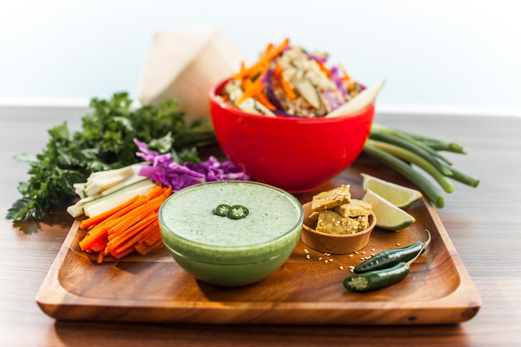 A dragon bowl base has high-quality protein, and nutrient dense vegetables over a whole grain base, or is sometimes served