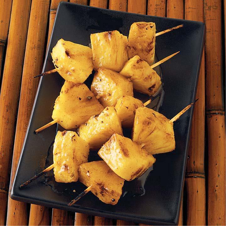 Pineapple Skewers with Brown Butter and Orange Juice Glaze Serves: 4 to 6 Prep time: 25 minutes Grilling time: 6 to 10 minutes 4 4 tablespoons unsalted butter cup light brown sugar, firmly packed ½