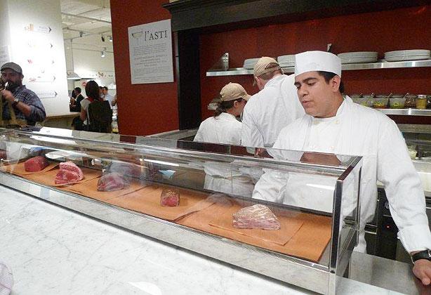 Mark Toscano, formerly of Babbo, mans the meat counter, which