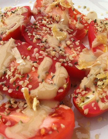 ROMA TOMATOES WITH HEMP SEEDS & TAHINI DRESSING Serves 2 2 tablespoons raw tahini 2-4 drops garlic oil 8-12 Roma tomatoes, halved 2 ½ tablespoons hemp seeds / hemp hearts In a small bowl combine the