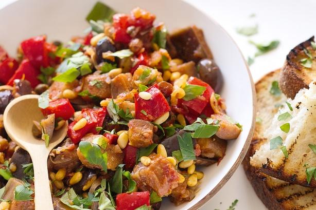 10. Caponata Craving for sweet and sour food? This Sicilian veggie dish made from aubergines, tomatoes, raisins and ciabatta is a must try if you re looking for a flavourful new dish to eat.