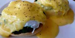 29 Eggs Benny Benedicts made with two poached eggs atop a toasted English muffin or bagel and covered with a light hollandaise sauce. Served with homestyle hash browns.