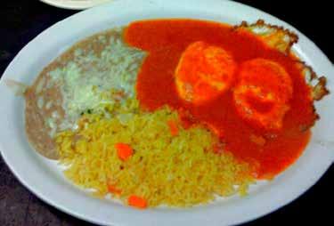 85 Arroz Con Pollo Grilled chicken or steak on a bed of Spanish rice covered with our delicious Queso dip! 7.35 Shrimp 10.
