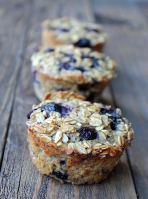 Blueberry Banana Baked Oatmeal Cups ½ cup brown sugar 2 eggs 2 ripe bananas, mashed 1 teaspoon pure vanilla extract ¼ cup plain (or vanilla) greek yogurt 1 cup unsweetened coconut milk 3 cups rolled
