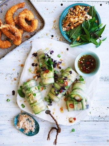 Cucumber and coconut prawn rice paper rolls with lime chilli dipping sauce 20 small green prawns, peeled, deveined, tails intact 2 eggs, lightly beaten 1/4 cup plain flour 1 cup shredded coconut