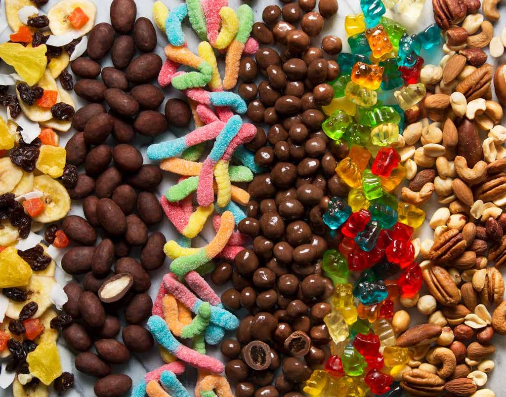 DELUXE MIXED NUTS GUMMI BEARS SCRUMPTIOUS SNACKS BEST-SELLING SNACKS FOR EVERY OCCASION CHOCOLATE COVERED RAISINS NEON WORMS COCOA DUSTED CHOCOLATE COVERED ALMONDS 6 ALLERGEN INDEX: EGG WHEAT MILK