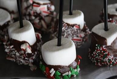Marshmallow Stir Sticks Marshmallows Chocolate chips or Almond Bark Sprinkles and/or Peppermint Candies Coffee Straws Wrap and Ribbon (Optional) Melt the chocolate of your choice in a glass