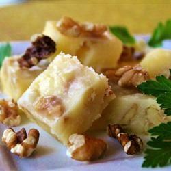 Easy Microwave Maple Fudge Makes: 64 Pieces 1 16 ounce package confectioners sugar 3 tablespoons milk 1 tablespoon maple extract 1/2 cup butter 3/4 cup chopped walnuts 1.
