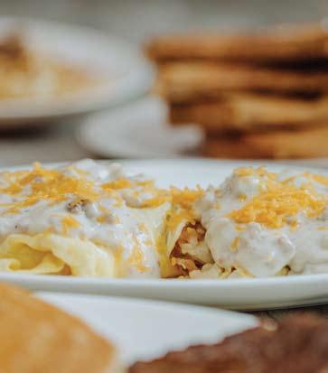 Ham, onion, cheddar cheese and 2 eggs cooked to your choice inside grilled hash browns Southern Omelet American cheese, diced onion, sausage, hash browns, topped with a layer of sausage