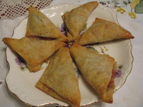 Oma s Purple Plum Turnovers for Pastry ½ cup margarine 1 cup flour ½ cup small curd cottage cheese for Filling 2 cups chopped prune plums (These bluish/purple plums are usually available in U.S.