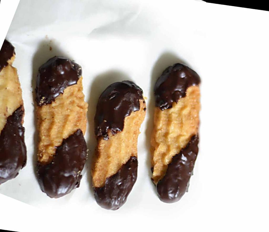 viennese fingers - the impressionist 100g unsalted butter, softened 25g icing sugar 1tsp vanilla extract 100g plain flour 1tsp corn flour 1/4th tsp baking powder 100g dark chocolate, chopped and