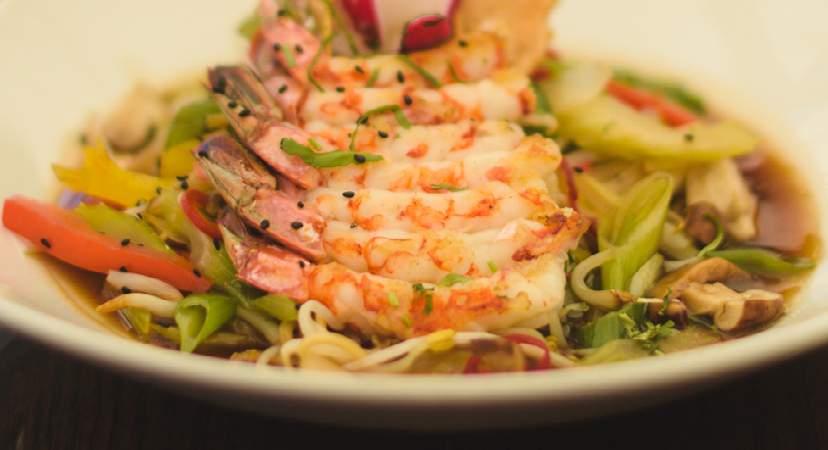 Thai and Asian specials specialities of the house PRAWN PHAD THAI NOODLES Stir fried rice noodles with prawn, egg,