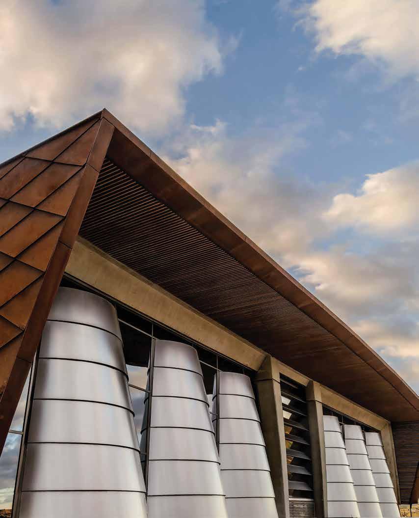 Bodegas Portia s exterior façade with stainless steel tanks of wine. It is one of the most cutting-edge wineries in Europe, designed by famed architect Norman Foster.