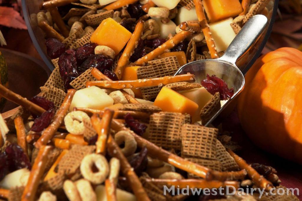 Holiday posts - Recipes This perfect mix of cereal, pretzels, dried fruits and cheeses will have your guests reaching into the bowl for more