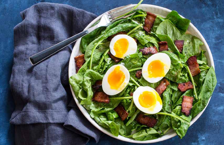 SIDES AND SALADS 18 Warm Spinach Salad with Soft Boiled Eggs and Bacon 2 large eggs 8 ounces fresh spinach 3 slices thick cut bacon 3 tablespoons reserved bacon fat 2 tablespoons white wine or rice