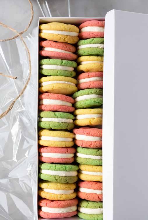 Chewy Easter Sandwich Cookies BRIGHT AND FRUITY WITH A CREAMY VANILLA BEAN FILLING, THESE FUN RAINBOW COOKIES MAKE A DELICIOUS ADDITION TO AN EASTER AFTERNOON TEA!