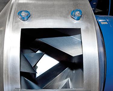 The stainless steel Munson blender uses a gravity-driven mixing process, which employs internal mixing flights that produce a tumble-turn-cut-fold mixing action said to yield 100 percent batch