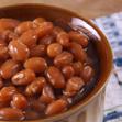 Jack in the Beans Makes 6 servings 2 tablespoons bacon drippings or oil 1 small onion, chopped 2 tablespoons brown sugar ¹/ ³ cup Jack Daniel s Tennessee Whiskey 1 can (28 ounces) baked beans 1