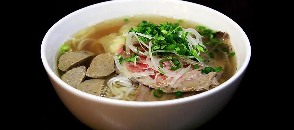 VIETNAMESE PHÓ Aromatic Beef Broth with Rice Noodle topped with White Onions, Green Onions, Cilantro and serviced with a side of fresh Herbs DAC BIET / SPECIAL COMBO...13.