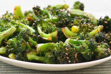12 oz broccoli (cut into 3 inch pieces) 1 tablespoon sesame oil ½ tsp sesame seeds Pam Cooking Spray Broccoli with Sesame Spray wok with Pam and