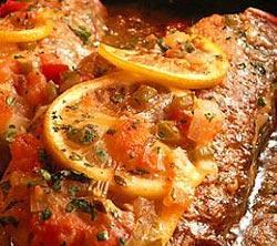 Creole Flounder 2 pounds flounder or other mild flavored fish fillets 2 medium tomatoes, chopped (1 1/2 cups) 1 small green bell pepper, chopped (1/2 cup) 1/3 cup lemon juice 2 teaspoons extra virgin