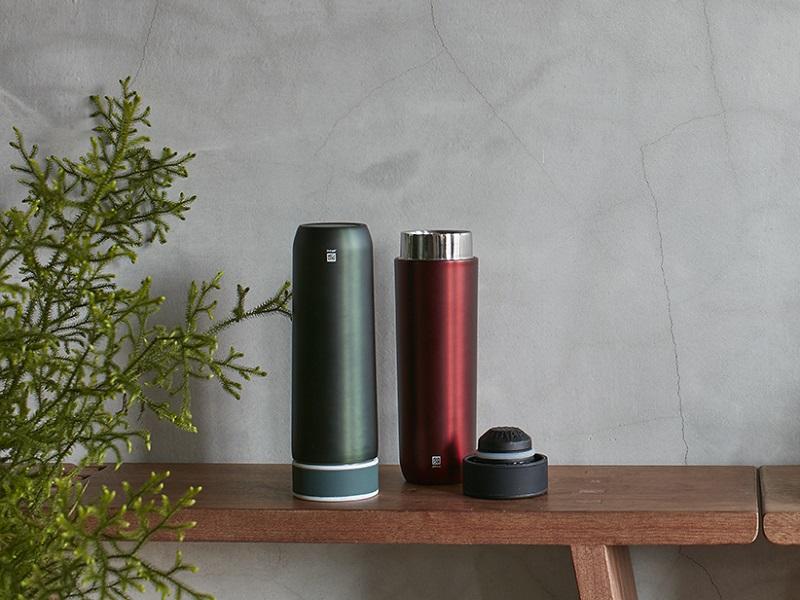 JIA Inc. Bamboo Charcoal Filter Bottle Purify water or brew lose leaf tea with a simple flip! Water nourishes all beings; the existence of all depends on water.