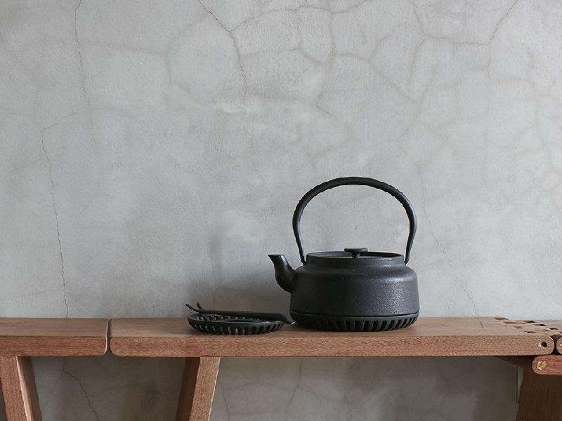 JIA Inc. Ironware Cast Iron Kettle refines the taste of water for brewing coffee and tea.
