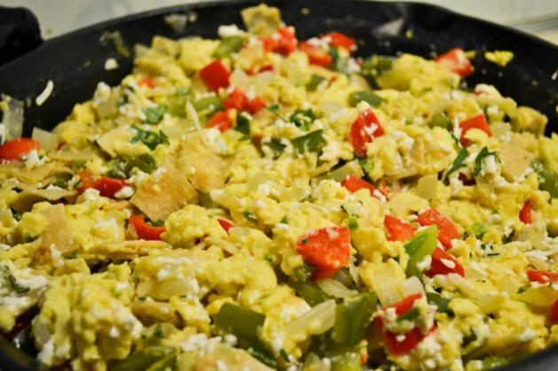 Migas 4 whole Corn Tortillas 1 whole Jalapeno, Seeds And Membranes Removed, Finely Diced 4 whole Plum Tomatoes, Roughly Chopped 1 whole Green Pepper, Roughly Chopped 1 whole Red Bell Pepper, Roughly