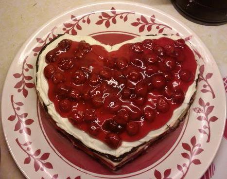 Cherry Chocolate Heart 1 package (15 ounces) refrigerated pie pastry 2 teaspoons all-purpose flour 1 egg white, lightly beaten 1/4 cup ground almonds 2 tablespoons sugar 1 package (8 ounces) cream
