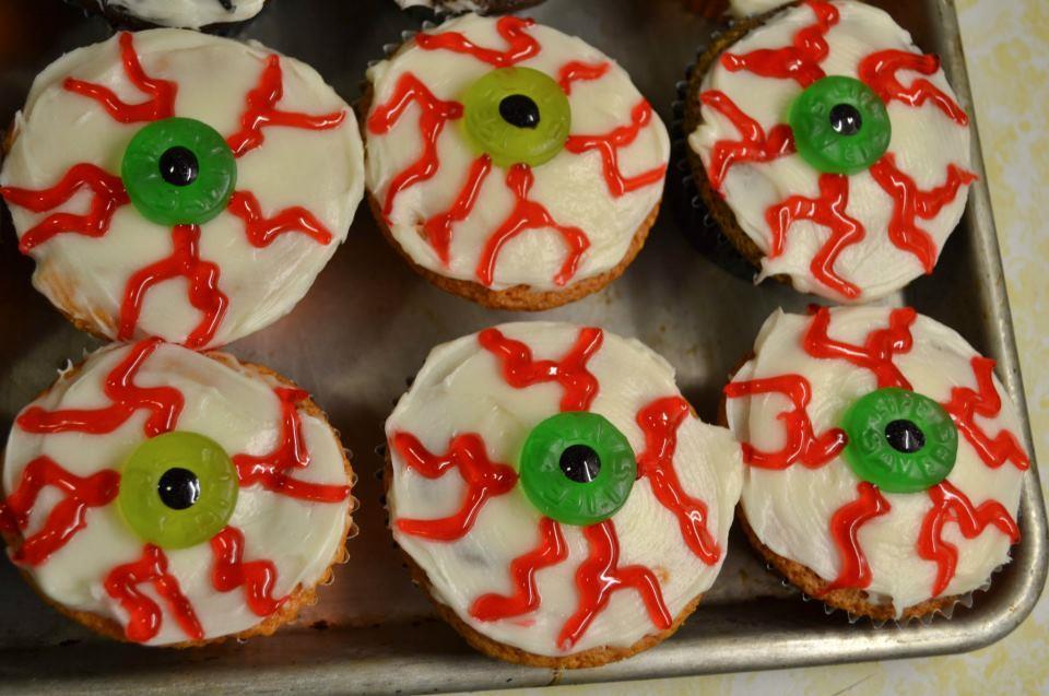 Eyeball Cupcakes Frost cupcakes with white icing.