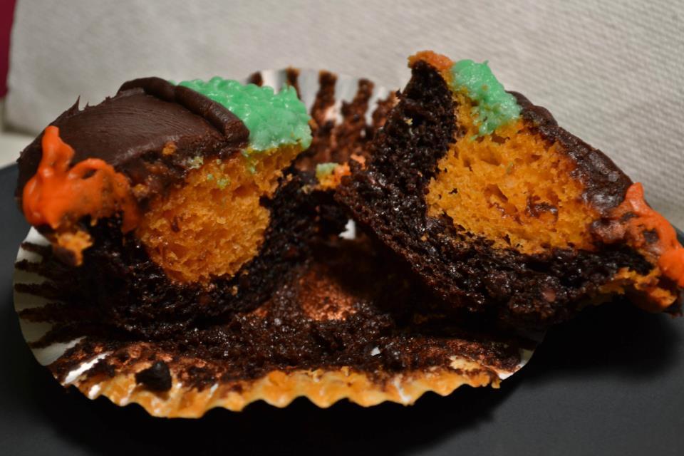 Orange and Black Cupcakes Use dark cake mix and light cake mix (dyed orange with food