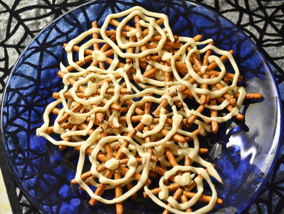 White Chocolate Pretzel Spider Webs Arrange pretzels into star shape.