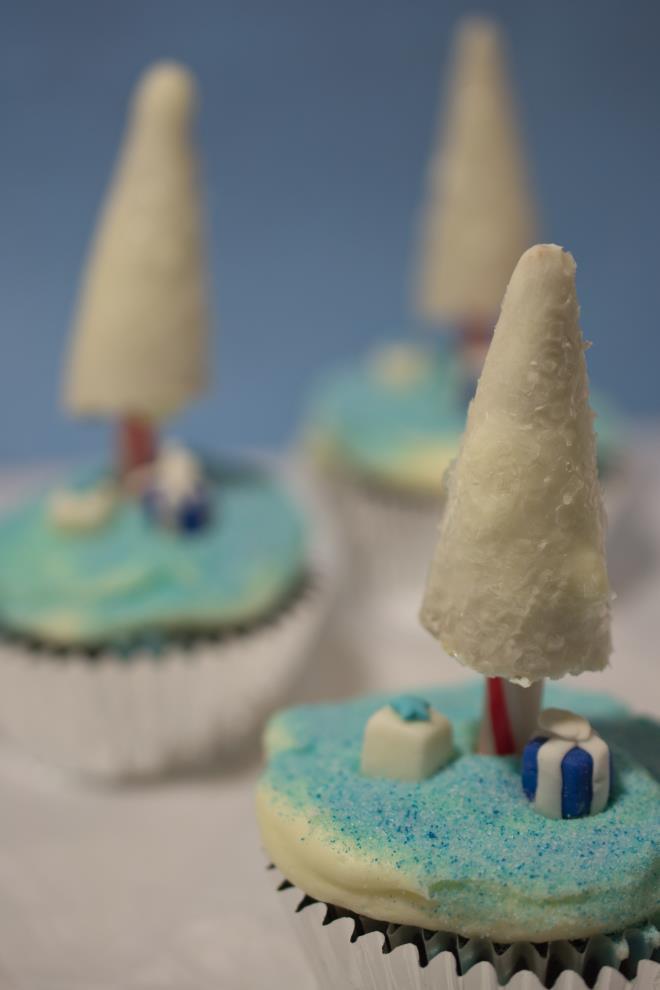 Fill the cone with some frosting and use part of a candy can