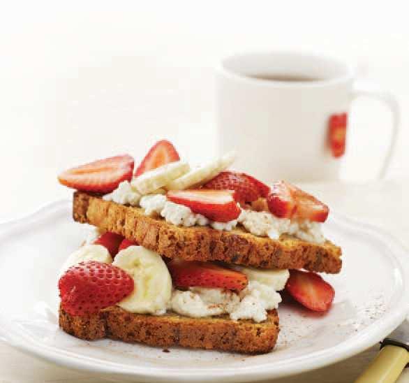 Spread toast with ricotta mixture and sprinkle with cinnamon. Layer banana and strawberries on top of toast and serve.