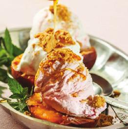 Grilled Peaches with Ice Cream Pound Cake 2 firm, medium ripened peaches, wedged 2 teaspoons of butter Topping crushed nuts maple syrup ice cream 1.