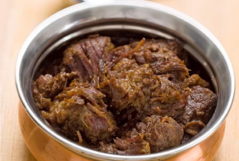 MAIN DISHES Indonesia Beef Rendang 6 dried long chillies, torn in half (seeded if you want less heat), soaked in hot water until soft 150g red onions, chopped 5 cloves garlic, chopped 3cm piece of