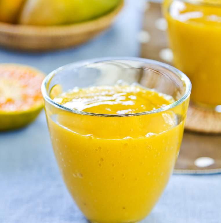 SMOOTHIES Mango Orange Smoothie 2 oranges, peeled 1 cup mango, peeled and diced 6 tablespoons plain yoghurt 2 cups milk ice cubes as needed 1.