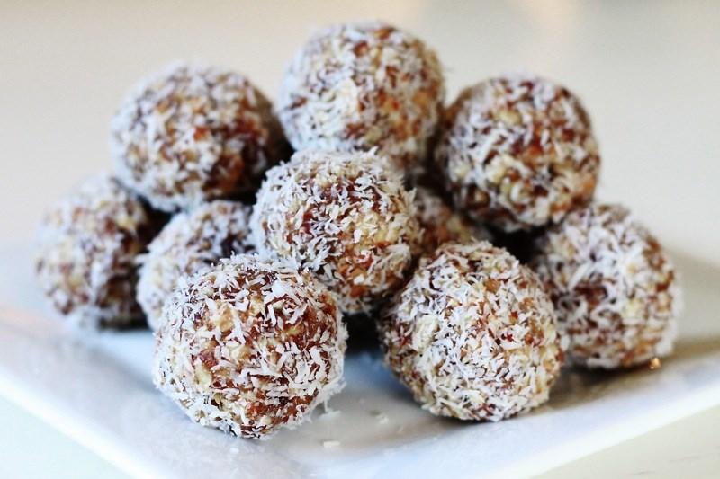 Almond Coconut Balls Submitted by Dani Brown 1c. finely shredded UNSWEETENED coconut, divided 1c. almond butter (NO sugar, salt or other additives) 1c. dried cranberries ½ c. raw honey ½ t. salt 2 T.